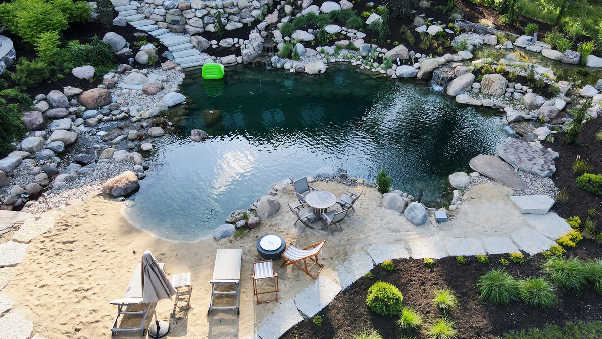 Natural aquascape pond with waterfall